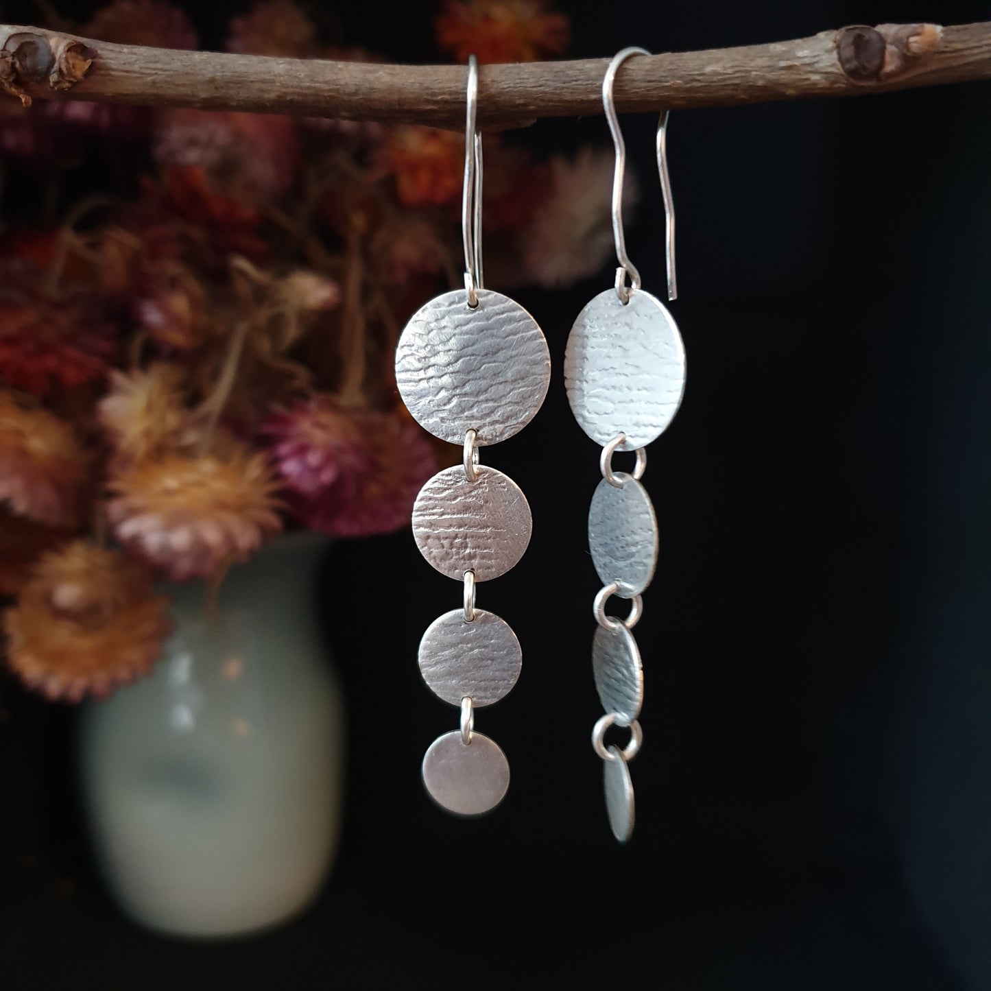 Silver multi disc/vintage lace imprint earrings